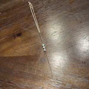gold and diamond hanging choker